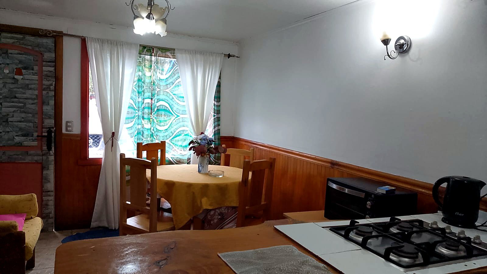 Comedor acogedor de la Posada Scholer en Frutillar Bajo